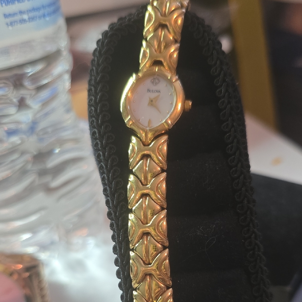 Bulova Women's Gold Watch with White Dial